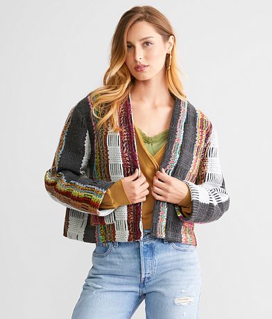 A. Peach Tweed Jacket front view