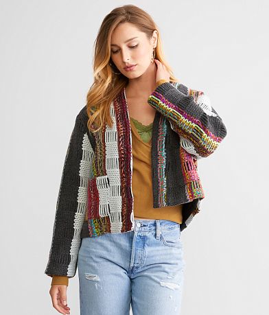 A. Peach Tweed Jacket full left side view