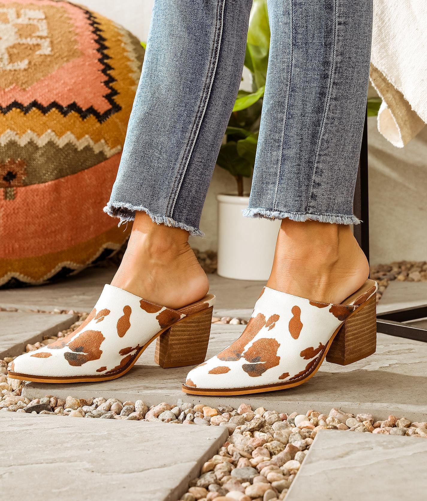 Cow store print mules