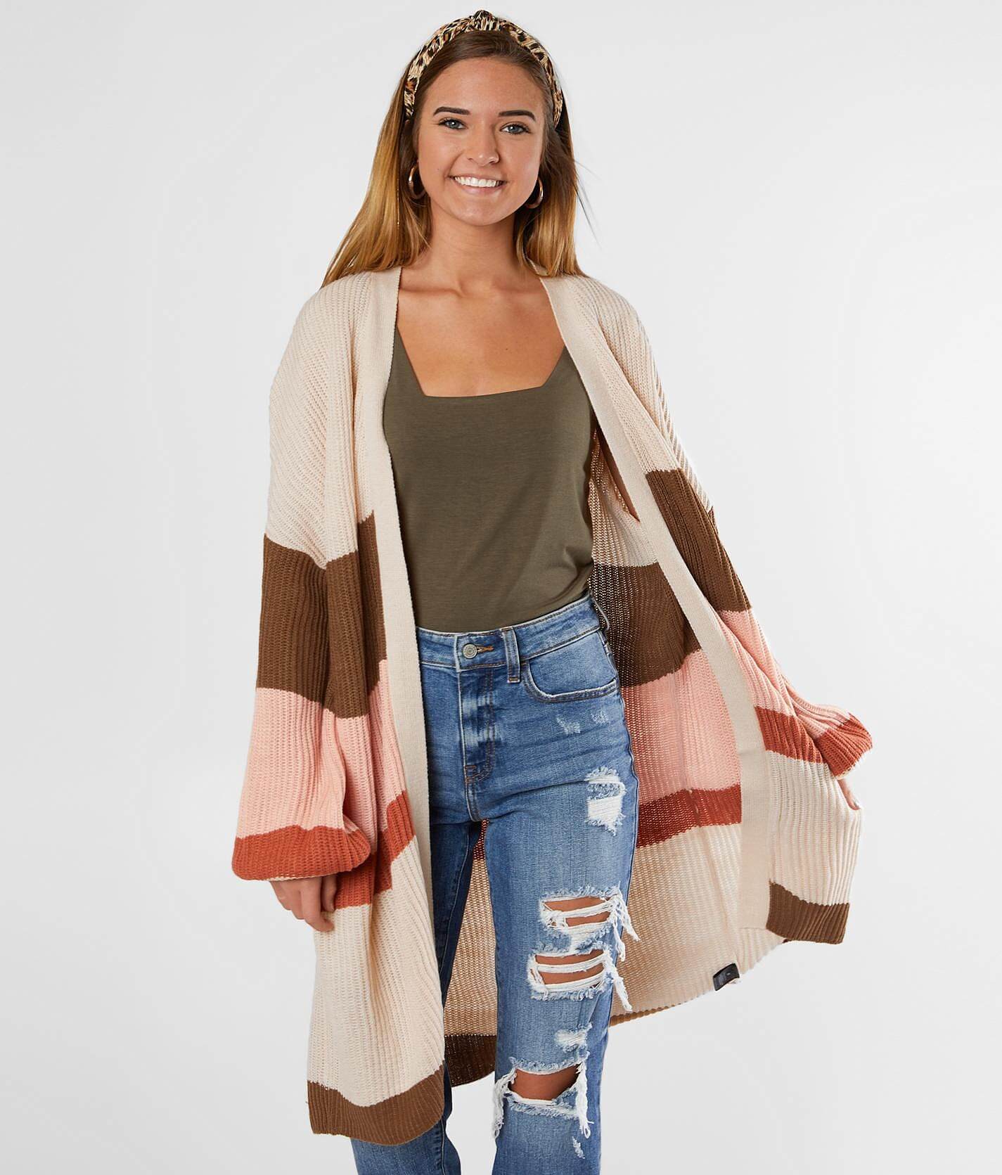 tan colored cardigan