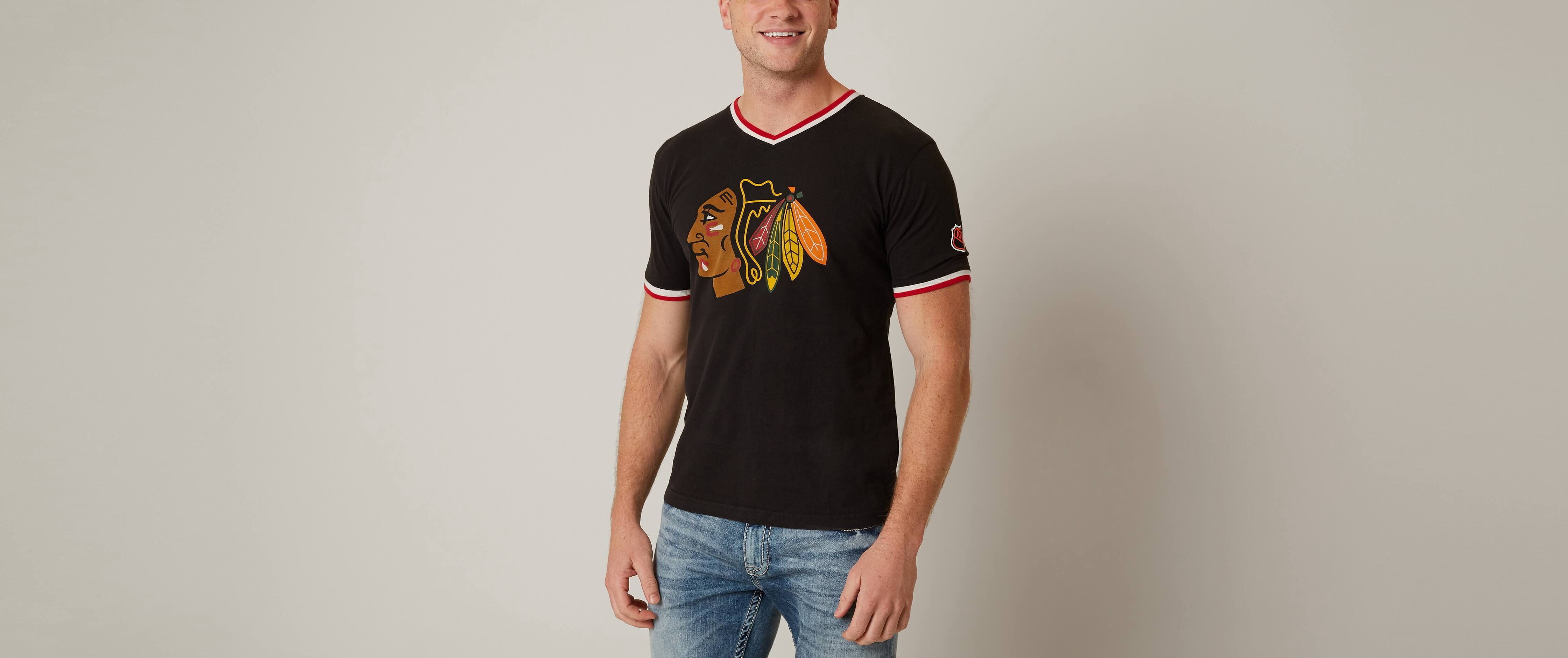 red jacket blackhawks shirt