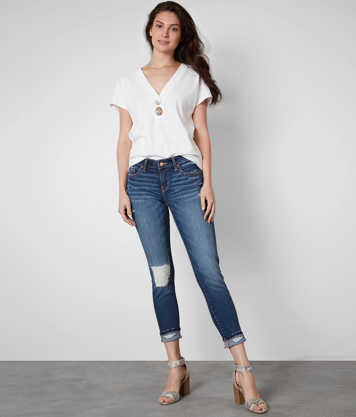 buckle black skinny jeans