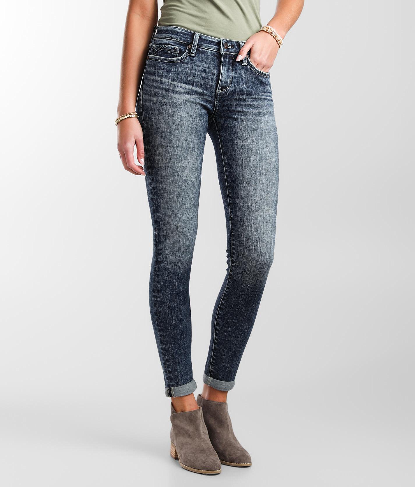 buckle black skinny jeans