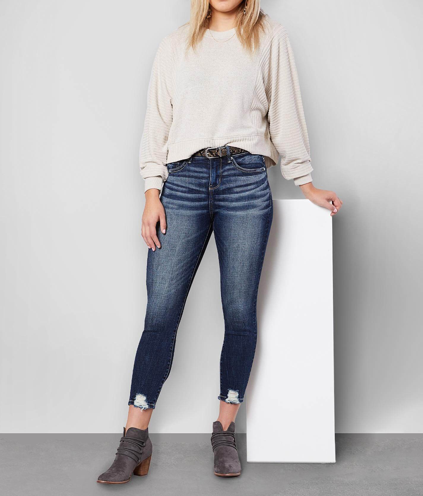buckle black skinny jeans