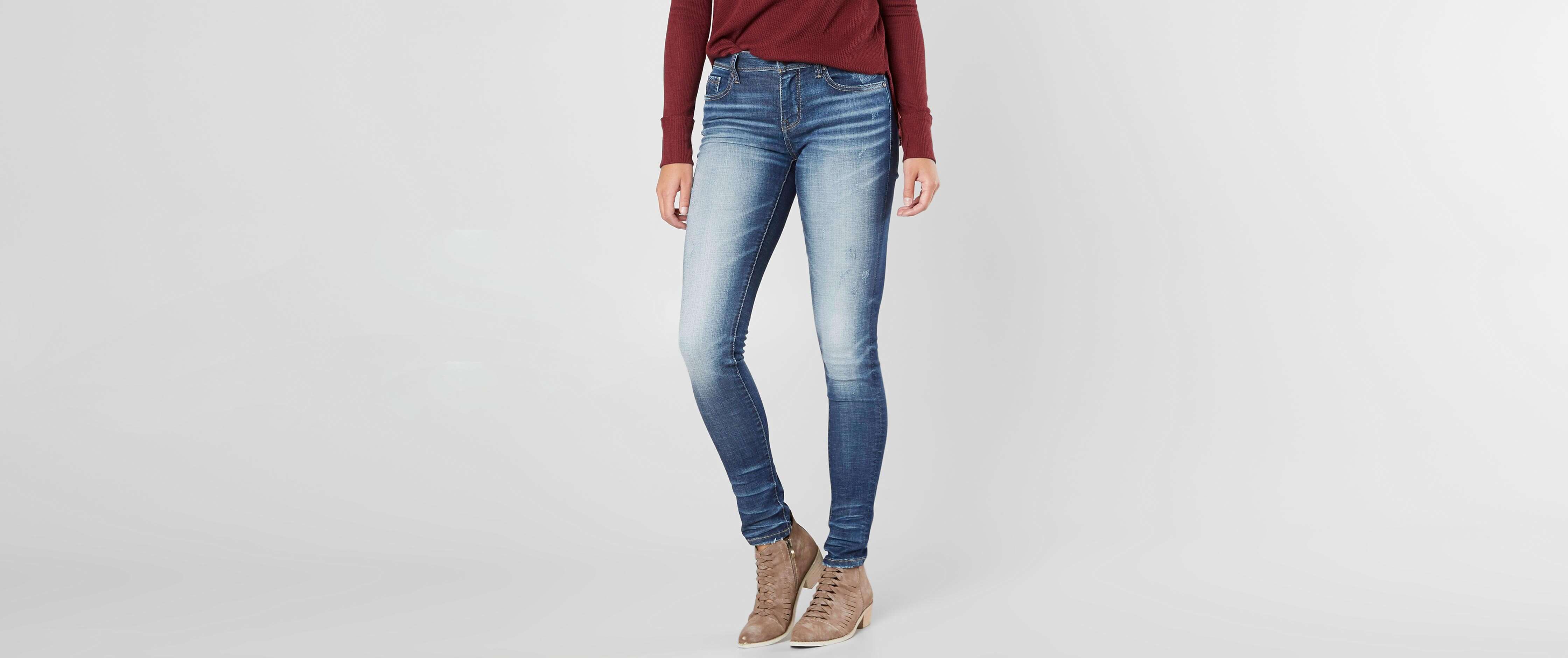 buckle black skinny jeans