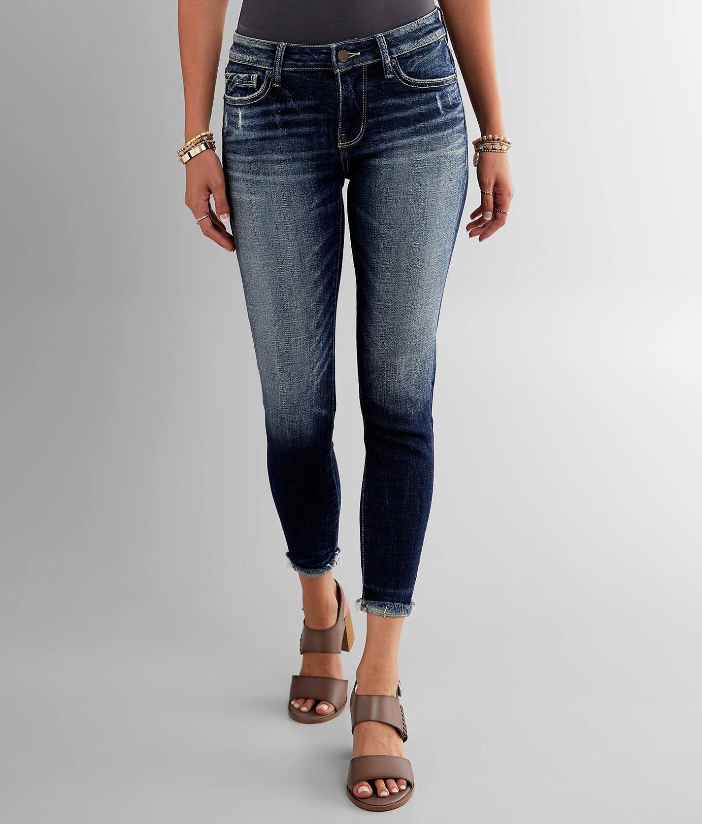 buckle black skinny jeans