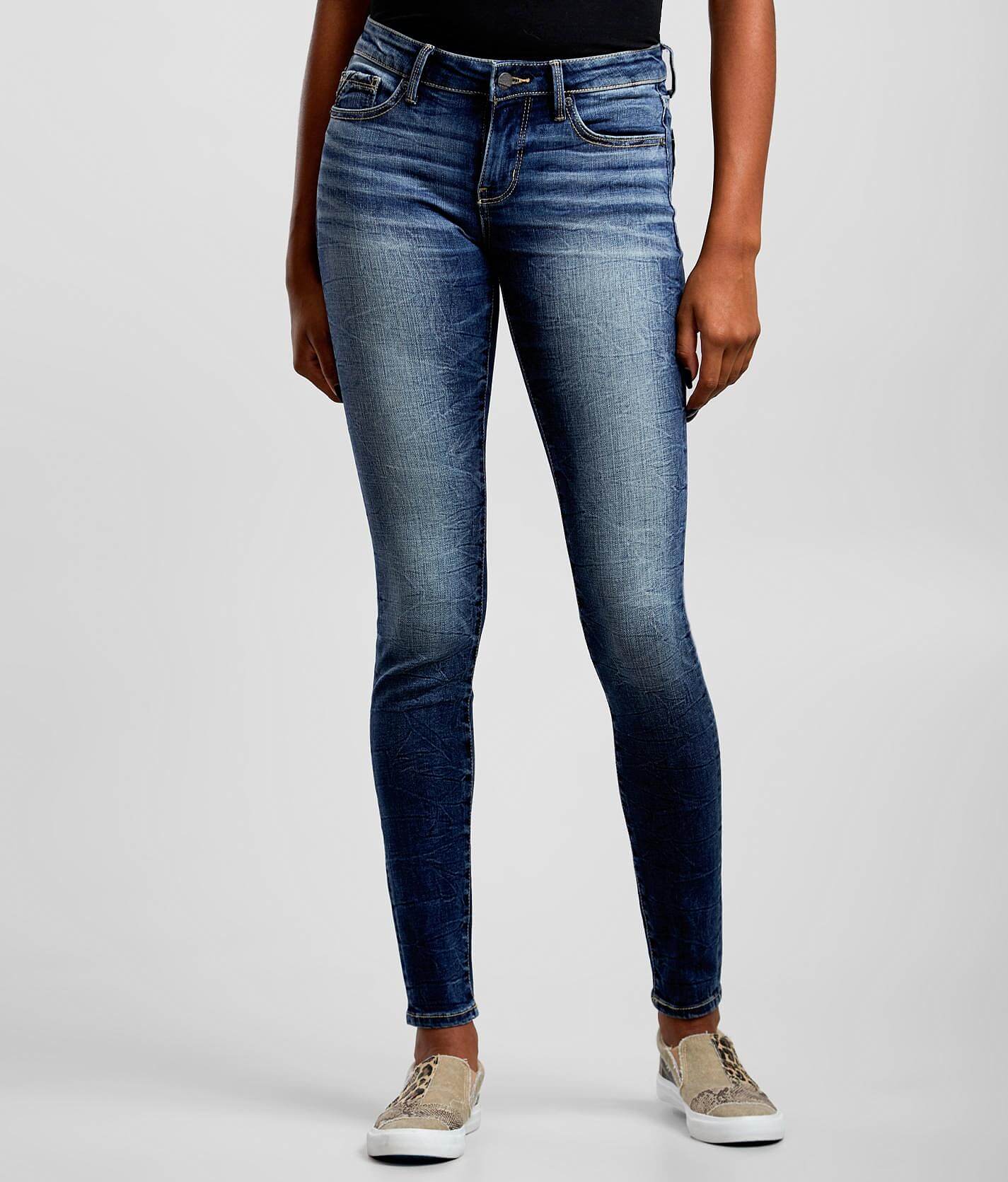 buckle black skinny jeans