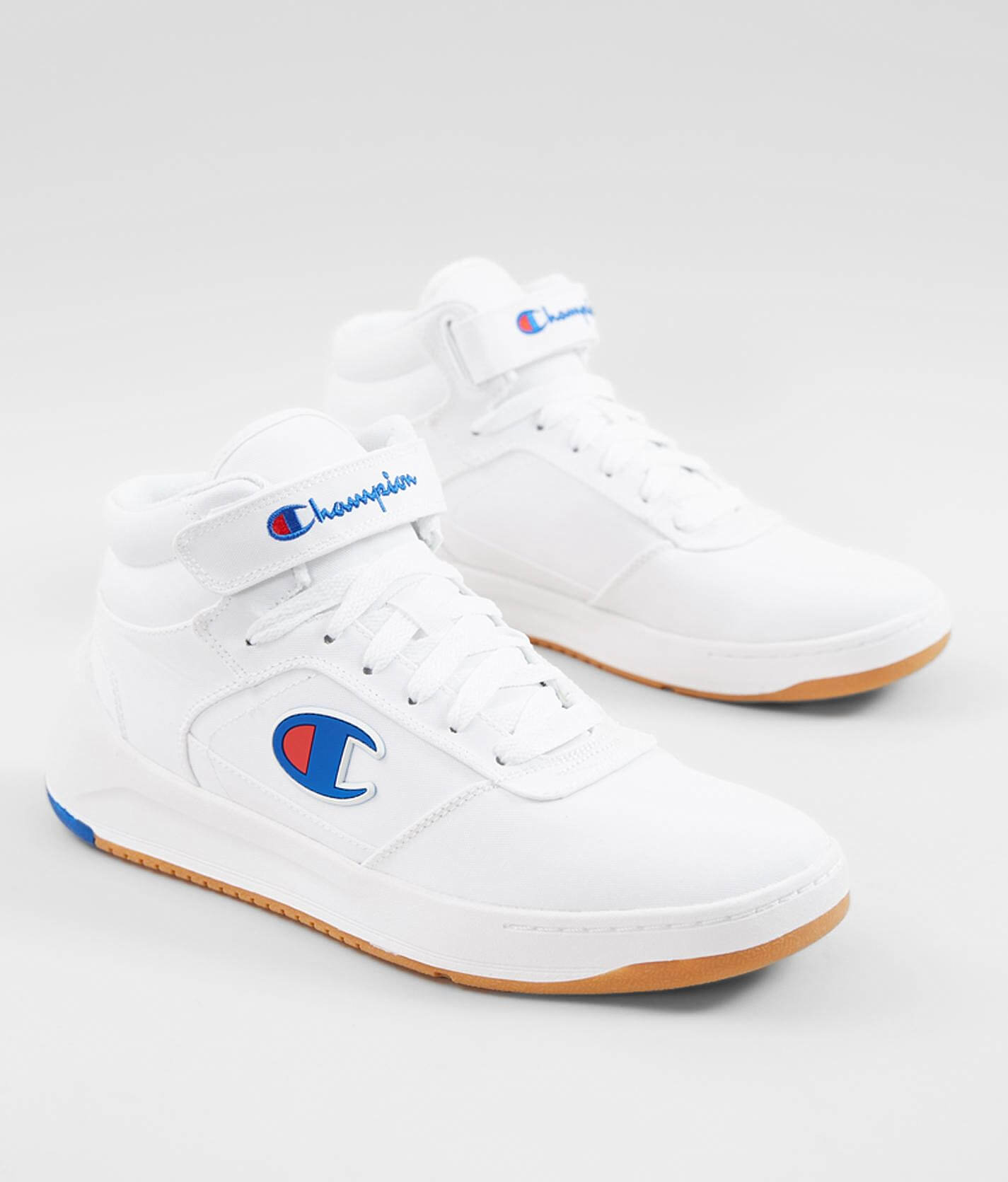 white and blue champion shoes