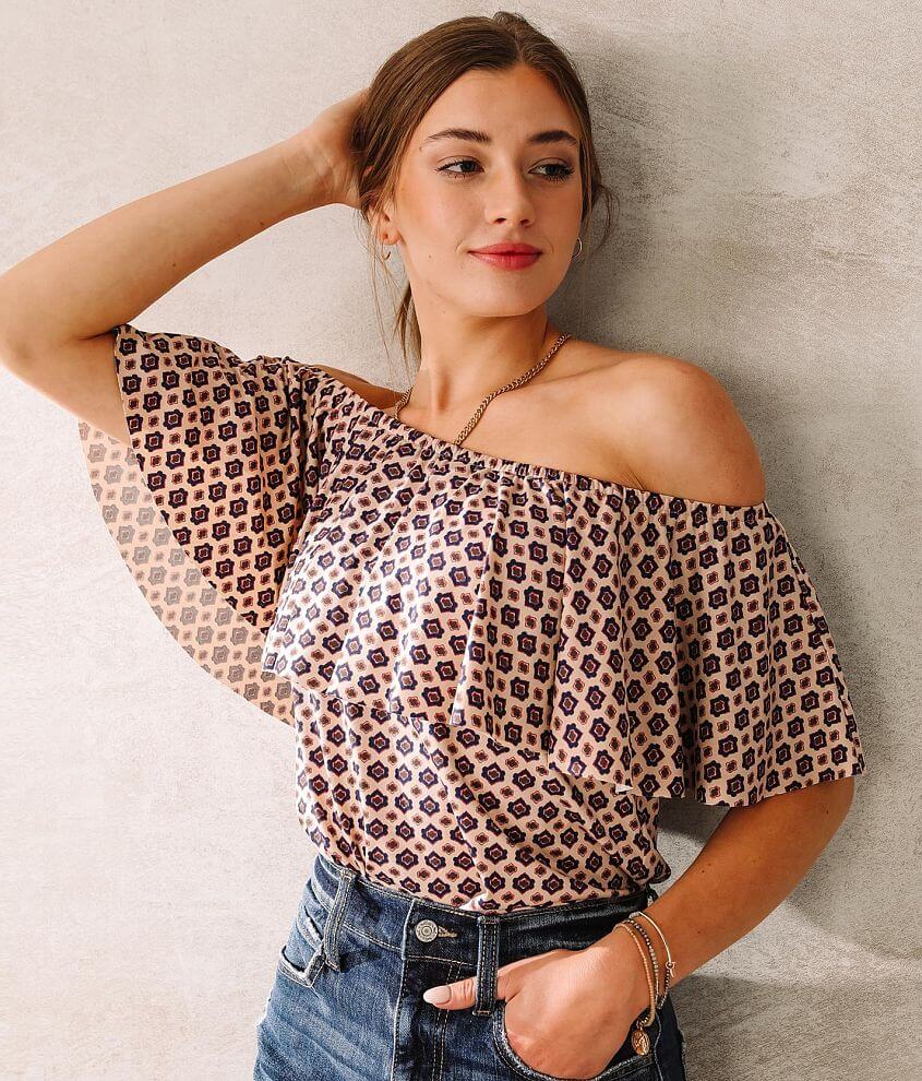 Shirts that hang discount off one shoulder