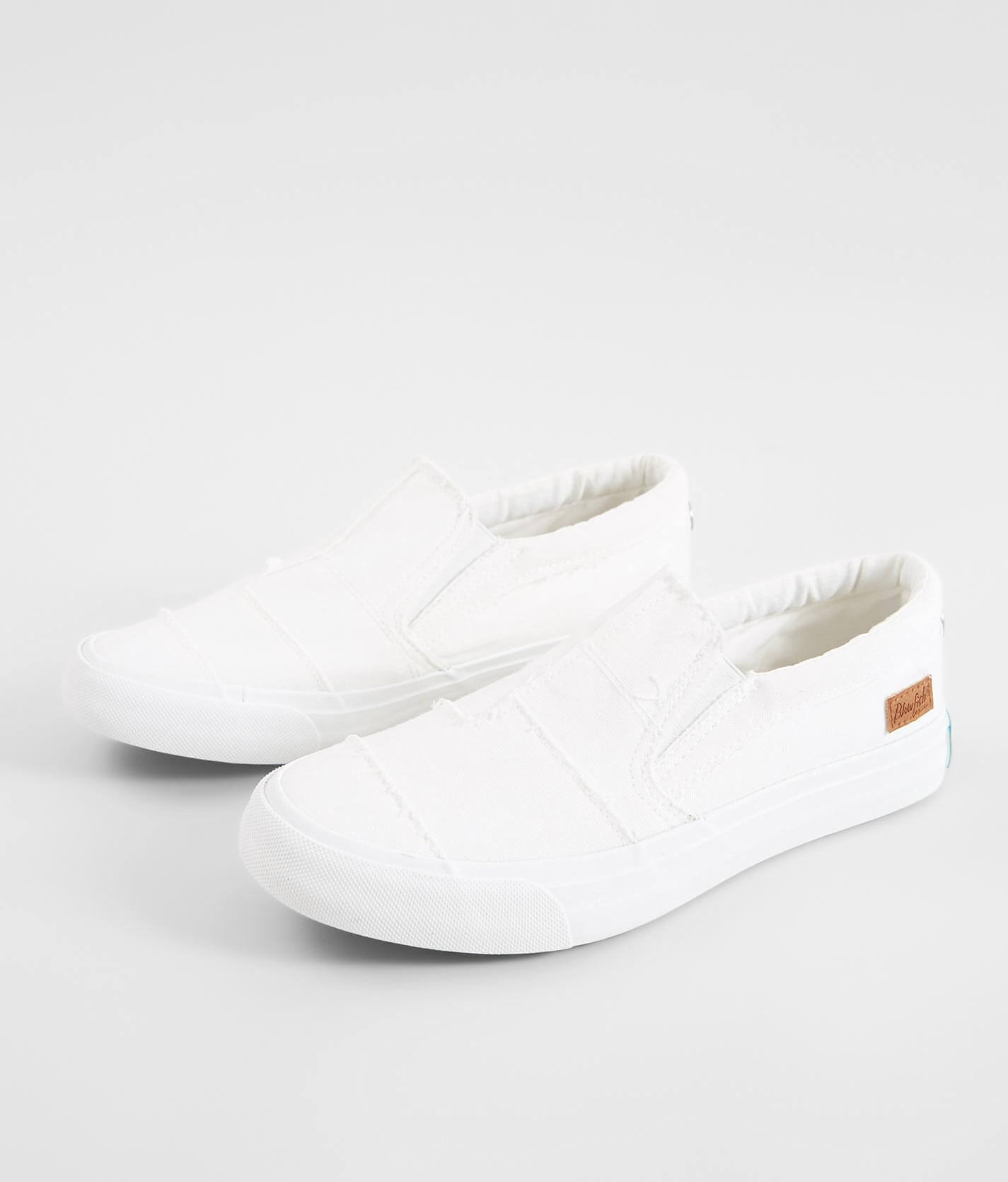 white canvas slip on shoes