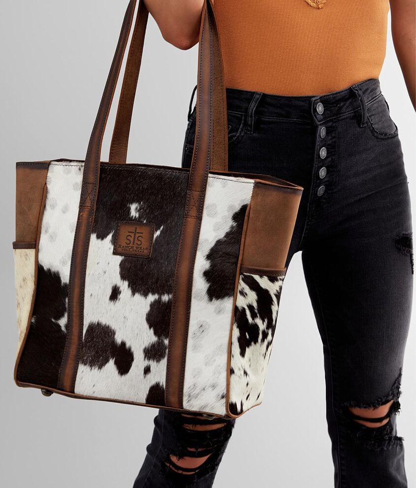 Distressed brown riveted cowhide purse