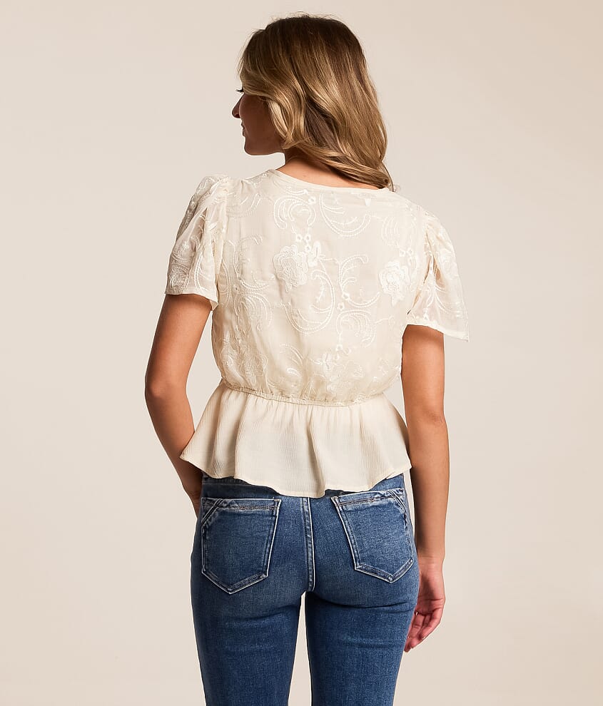Embroidered Peplum Top