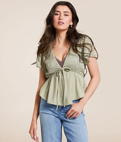 Daytrip Embroidered Peplum Top front view