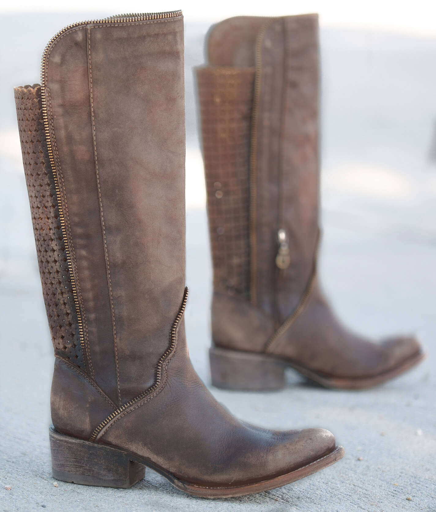 distressed riding boots