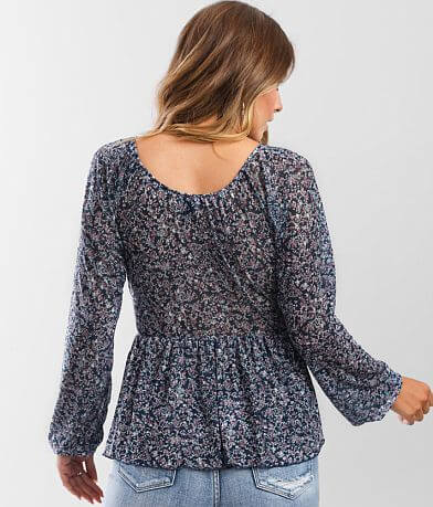 Daytrip Twisted Floral Mesh Peplum Top back view