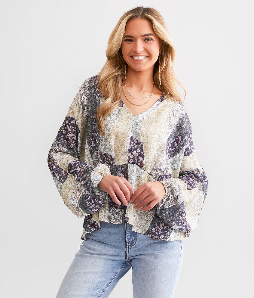 Daytrip Floral Peplum Dolman Top front view