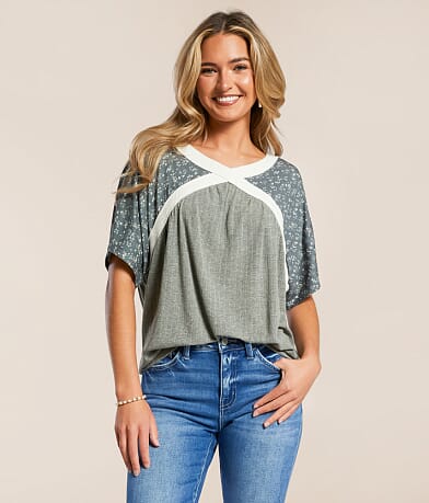 Daytrip Pieced Floral Dolman Top front view