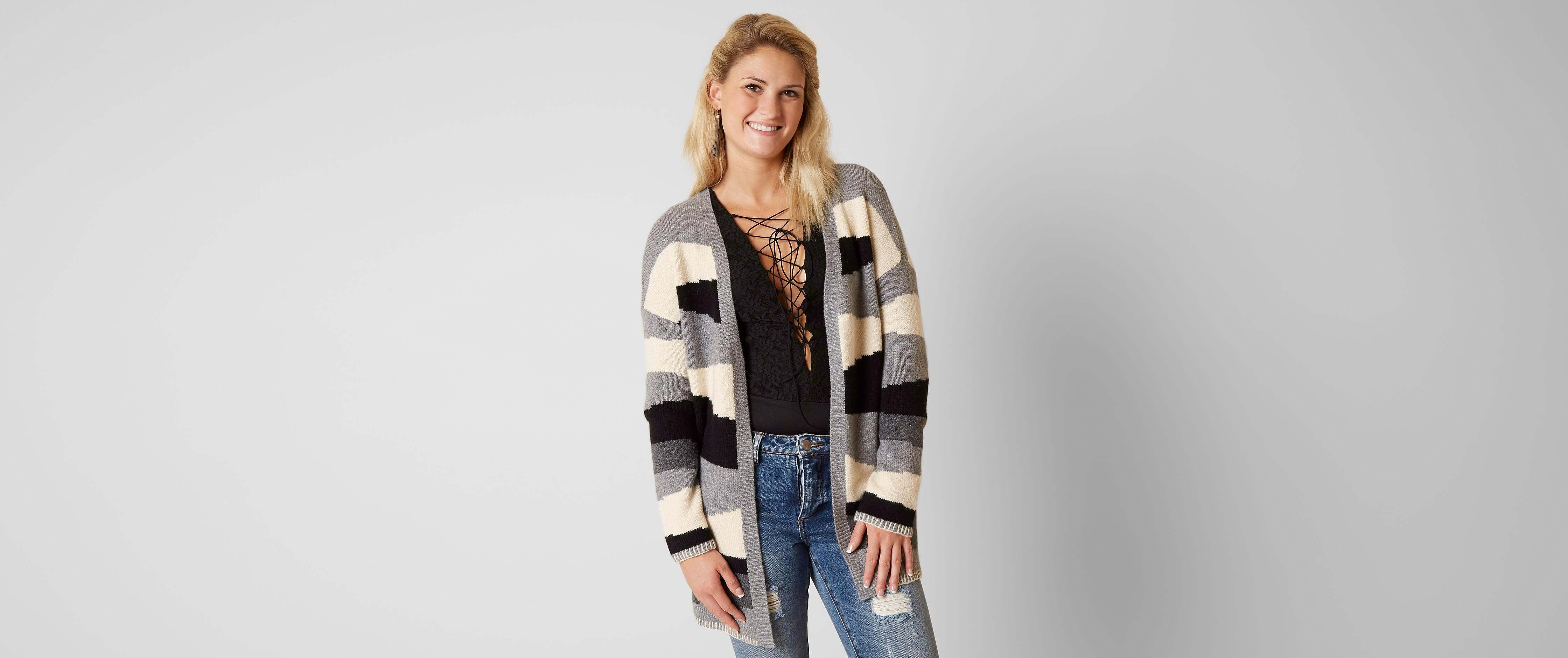 cream colored cardigan sweater