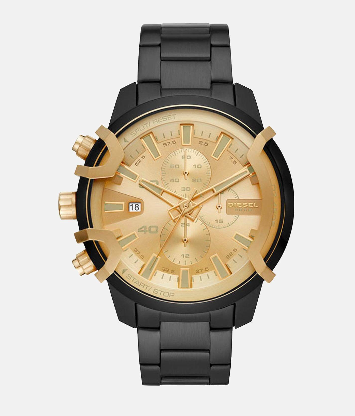 gold and black diesel watch