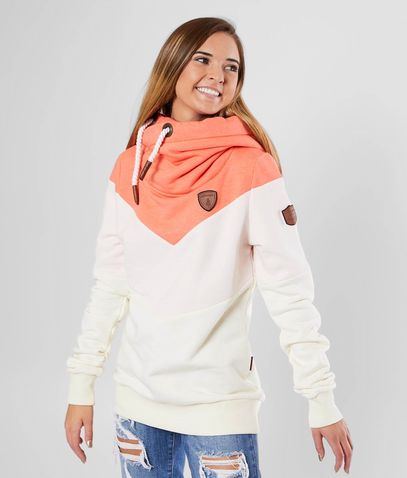 peach colored sweatshirt