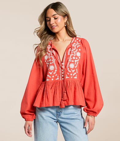 En Creme Embroidered Peplum Top front view