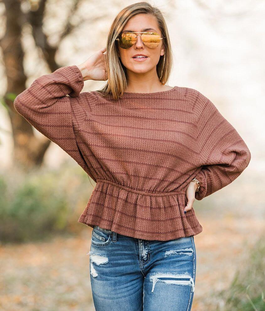 En Creme Striped Waffle Knit Peplum Top front view