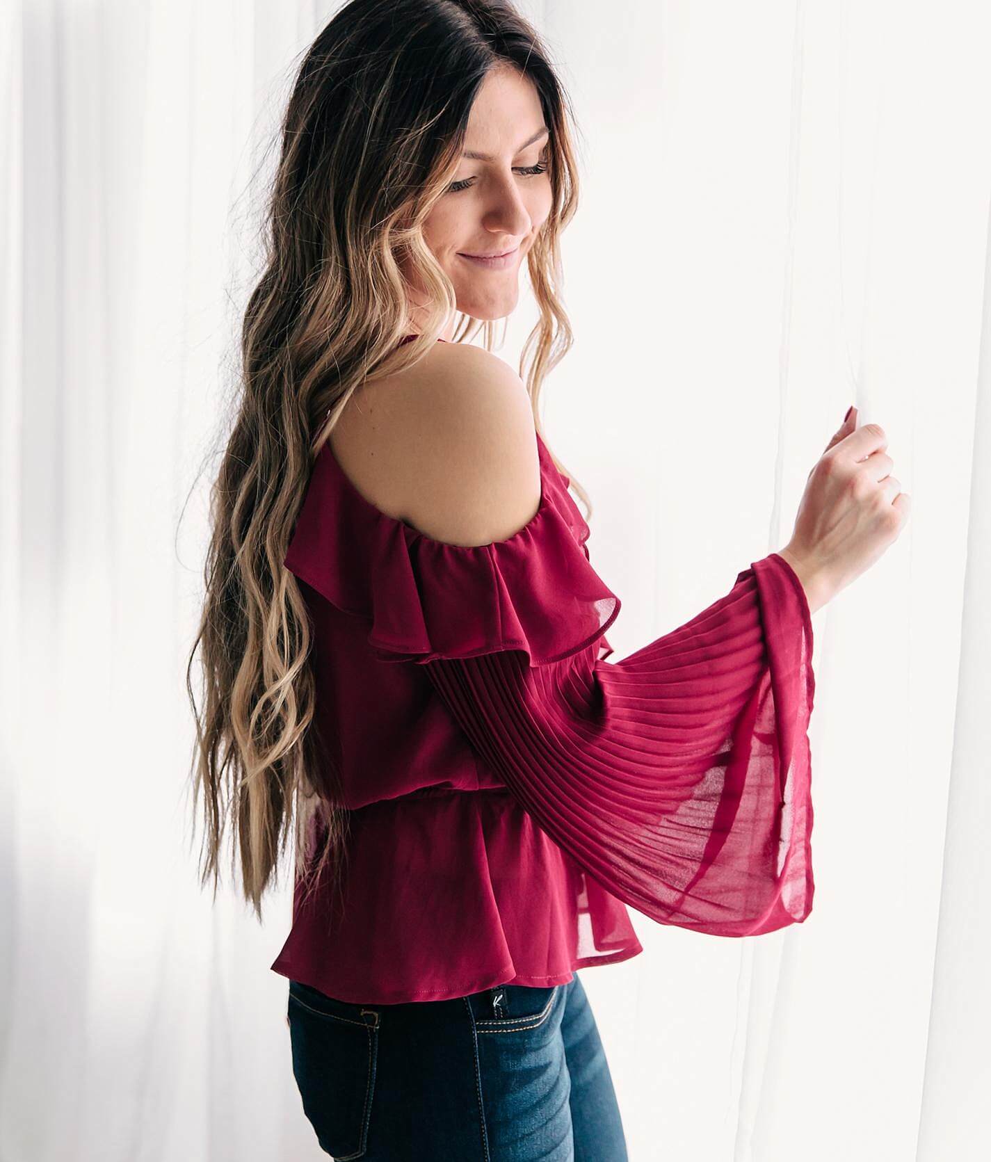 peplum cold shoulder top