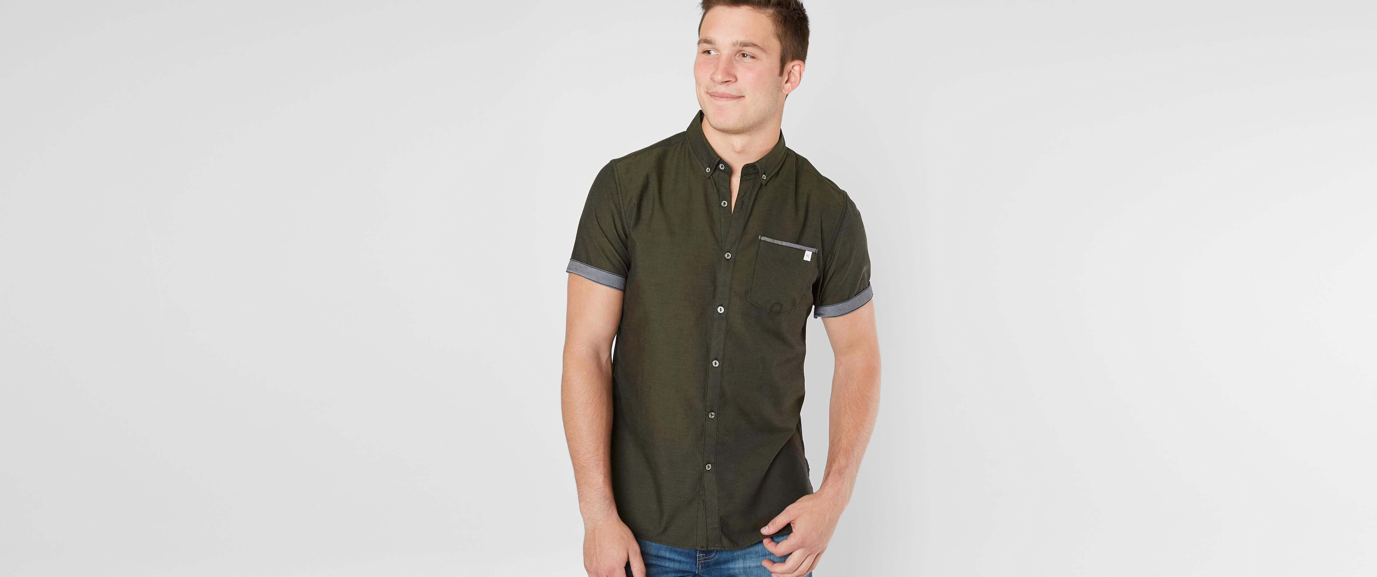 black jeans olive shirt
