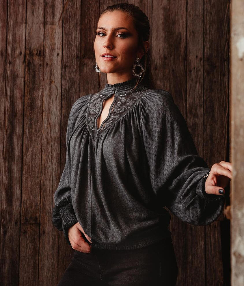 Image of Gimmicks Embellished Mock Neck Dolman Top