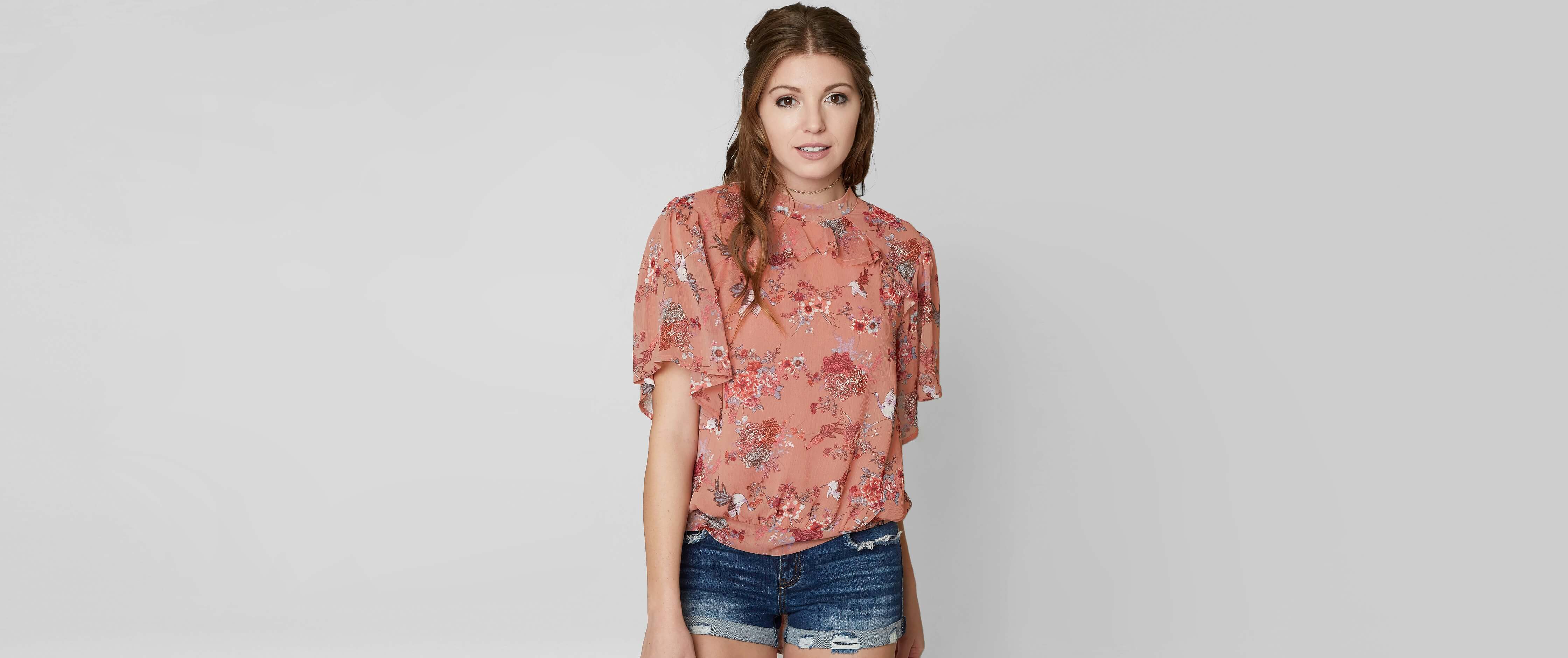 Image of Gimmicks Floral Mock Neck Top