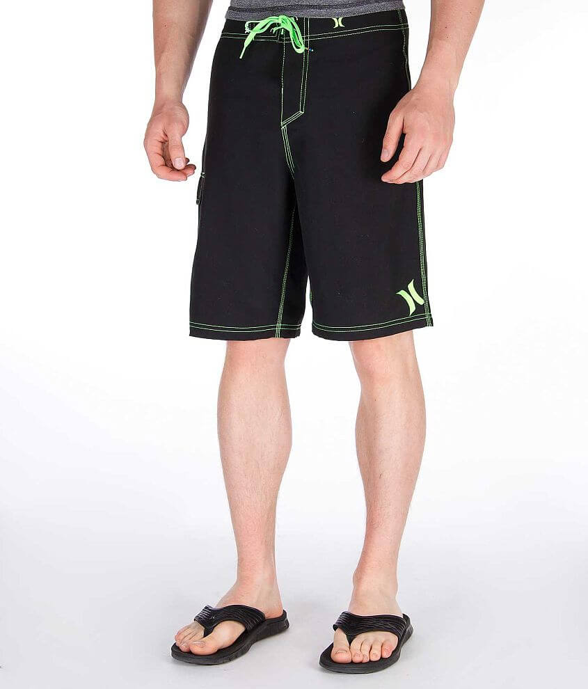 black and neon green shorts