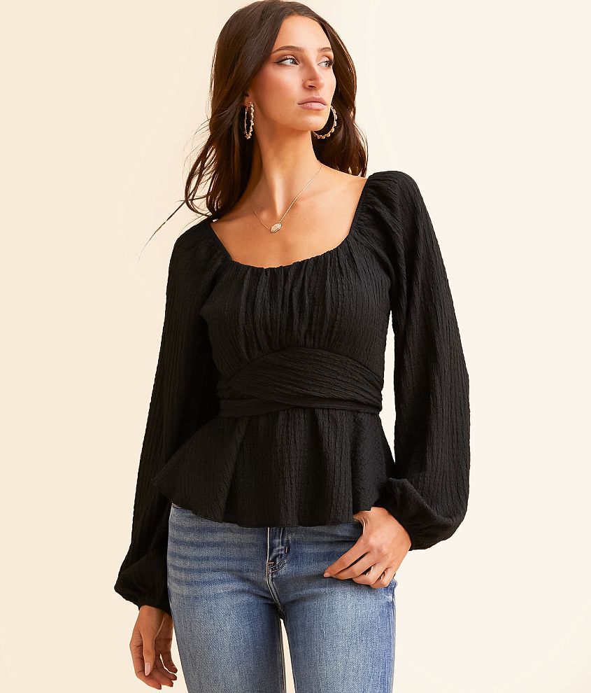 Daytrip Textured Peplum Top front view