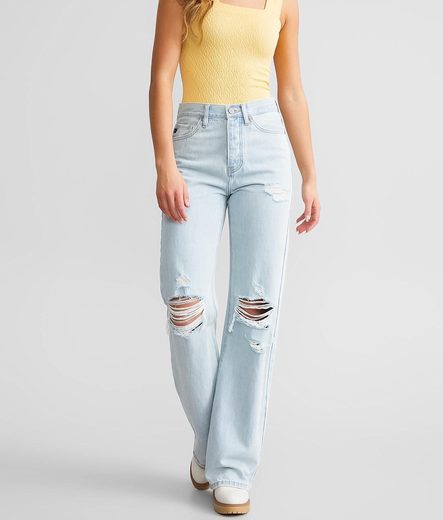 Jeans 90's flare con outlet rotos