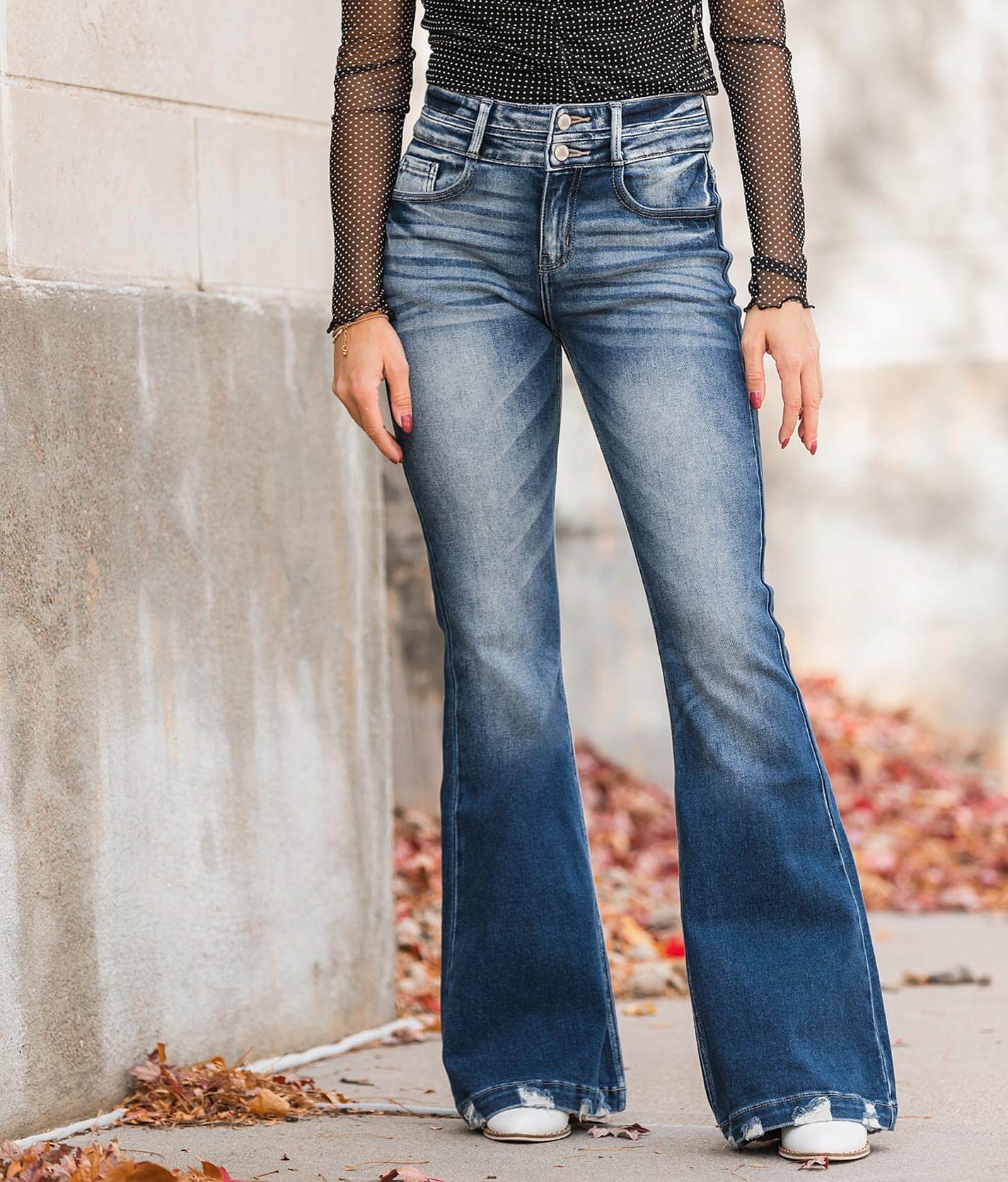 Как носить широкие джинсы женские