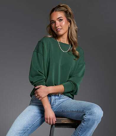 Buckle Black Pieced Seam Pullover front view