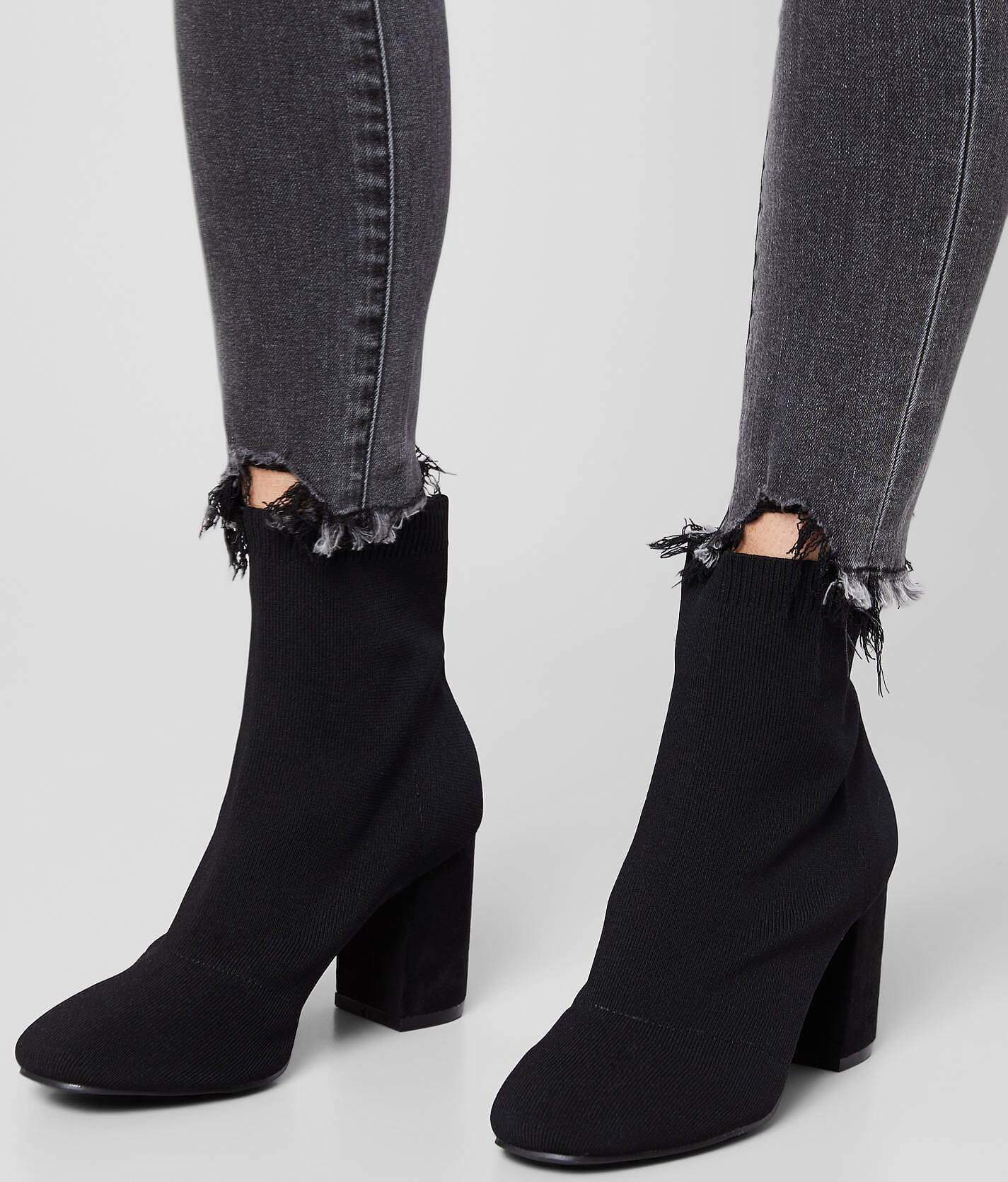 black buckle ankle boots