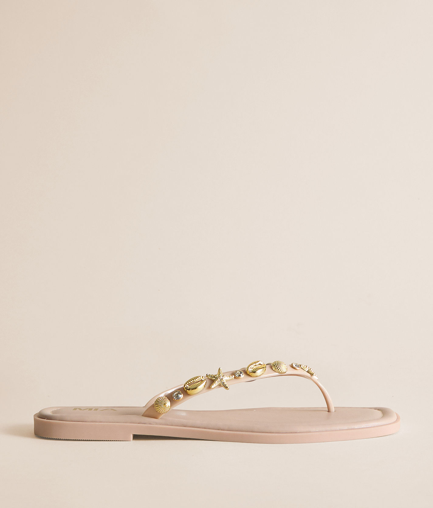 C R N ❤︎ Mia Wyniie Beach Charm Flip Flop - Women's Shoes in Nude | Buckle