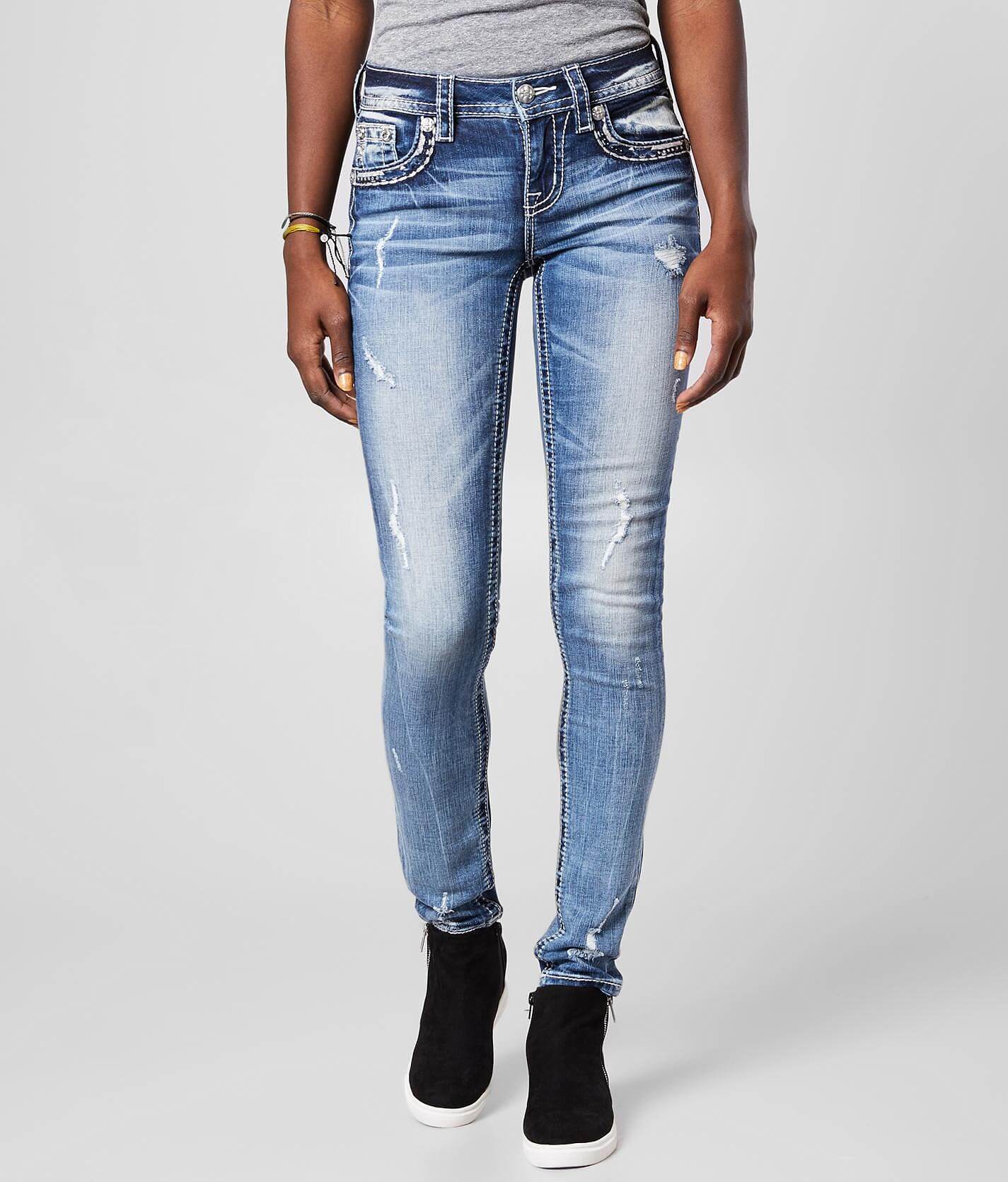 mid rise raw edge rockstar jeans