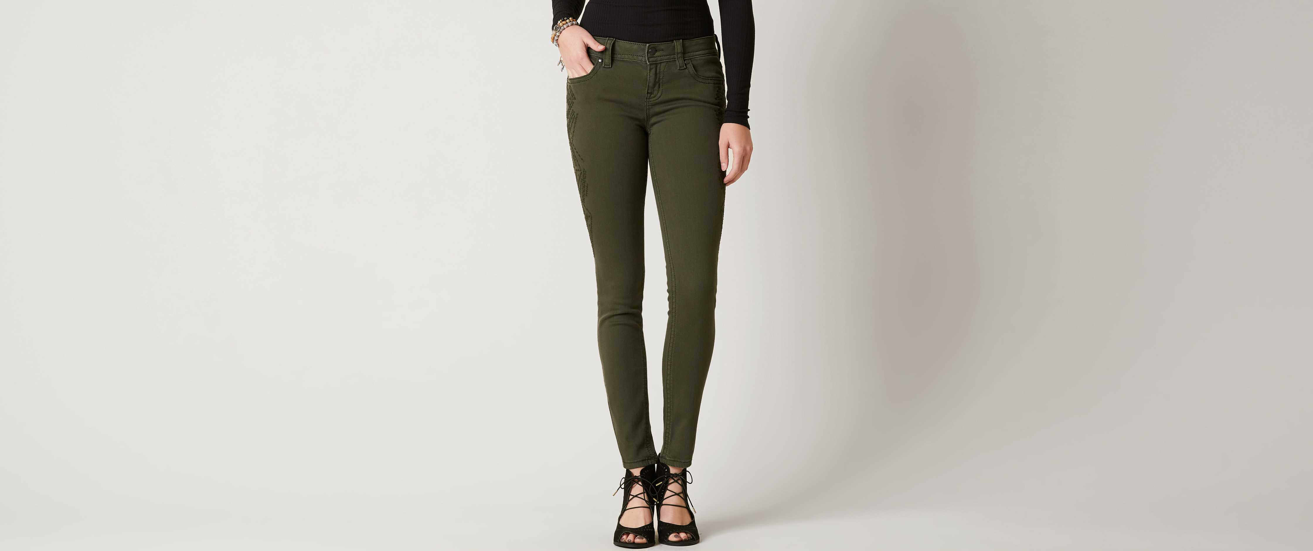 olive skinny jeans womens