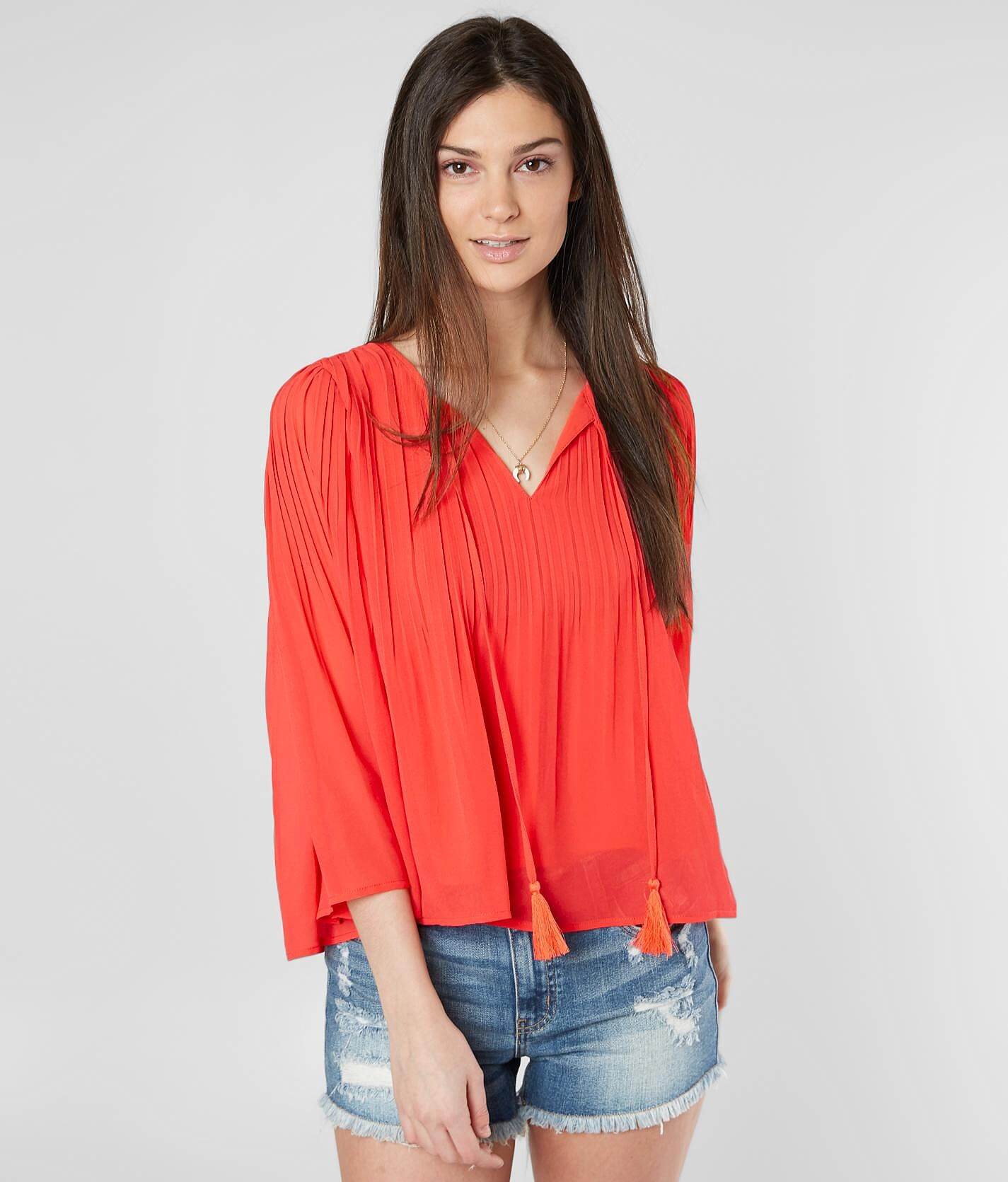 red flowy top