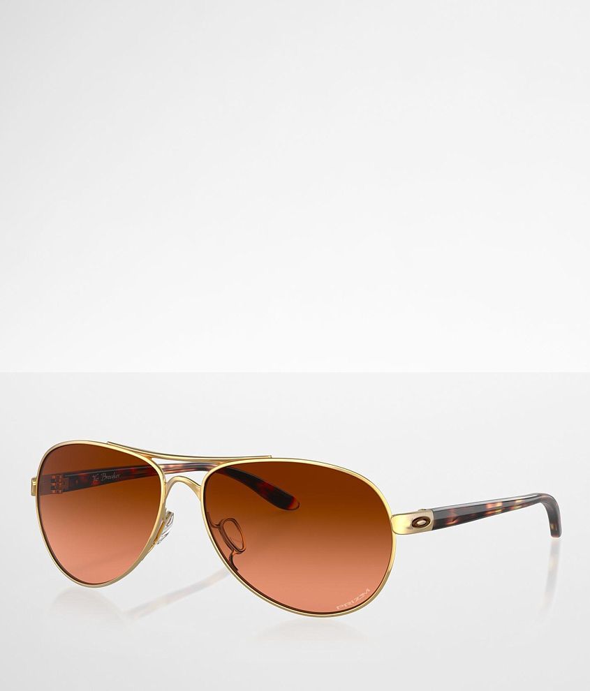 Oakley Tie Breaker Aviator Sunglasses Women's Sunglasses & Glasses in Gold | Buckle