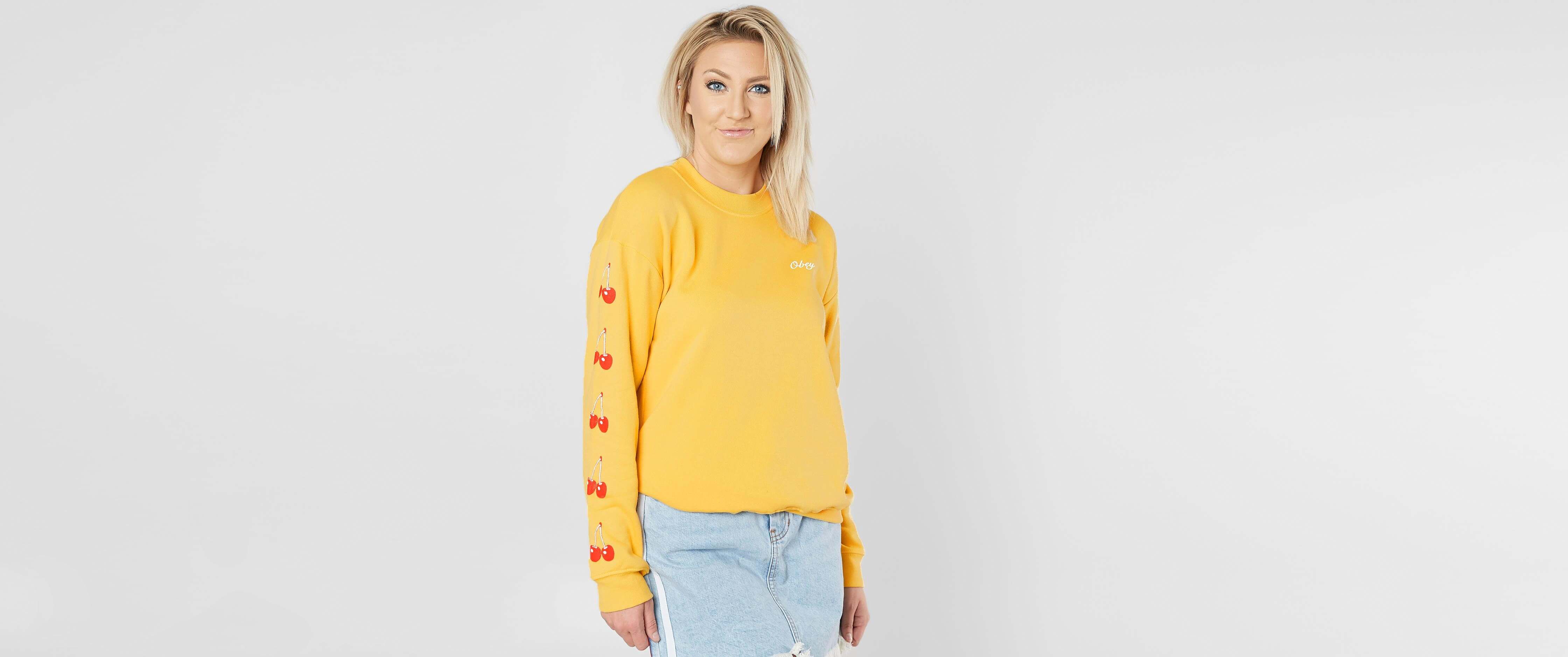 yellow obey sweater