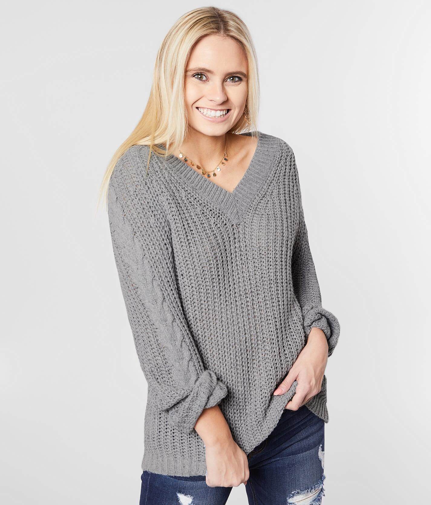 grey v neck sweater