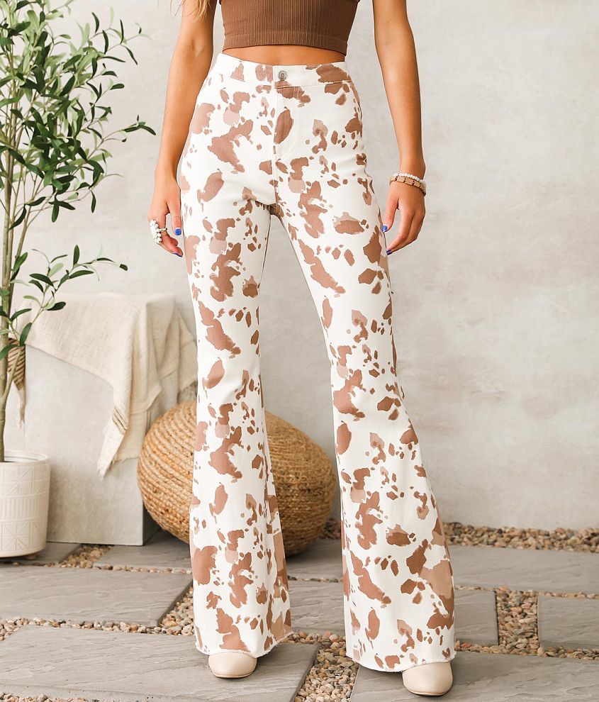 Peach Love California Pink Cow Print Flare Jeans - $30 (57% Off