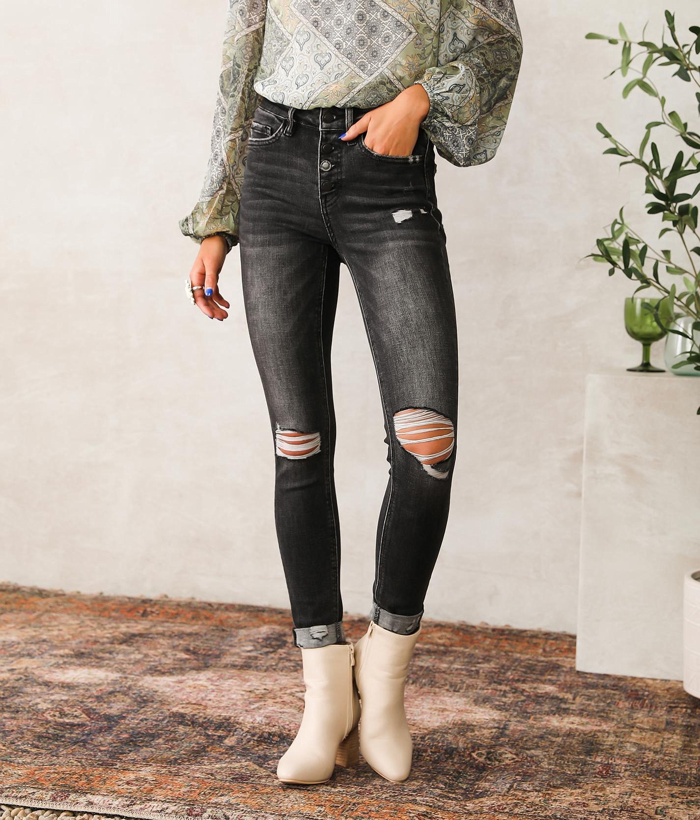 buckle ripped jeans