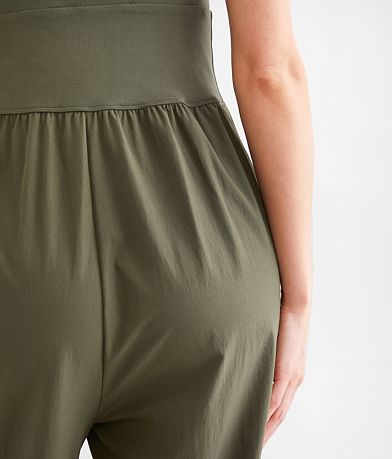 BKE Strappy Cut-Out Jumpsuit back pocket view