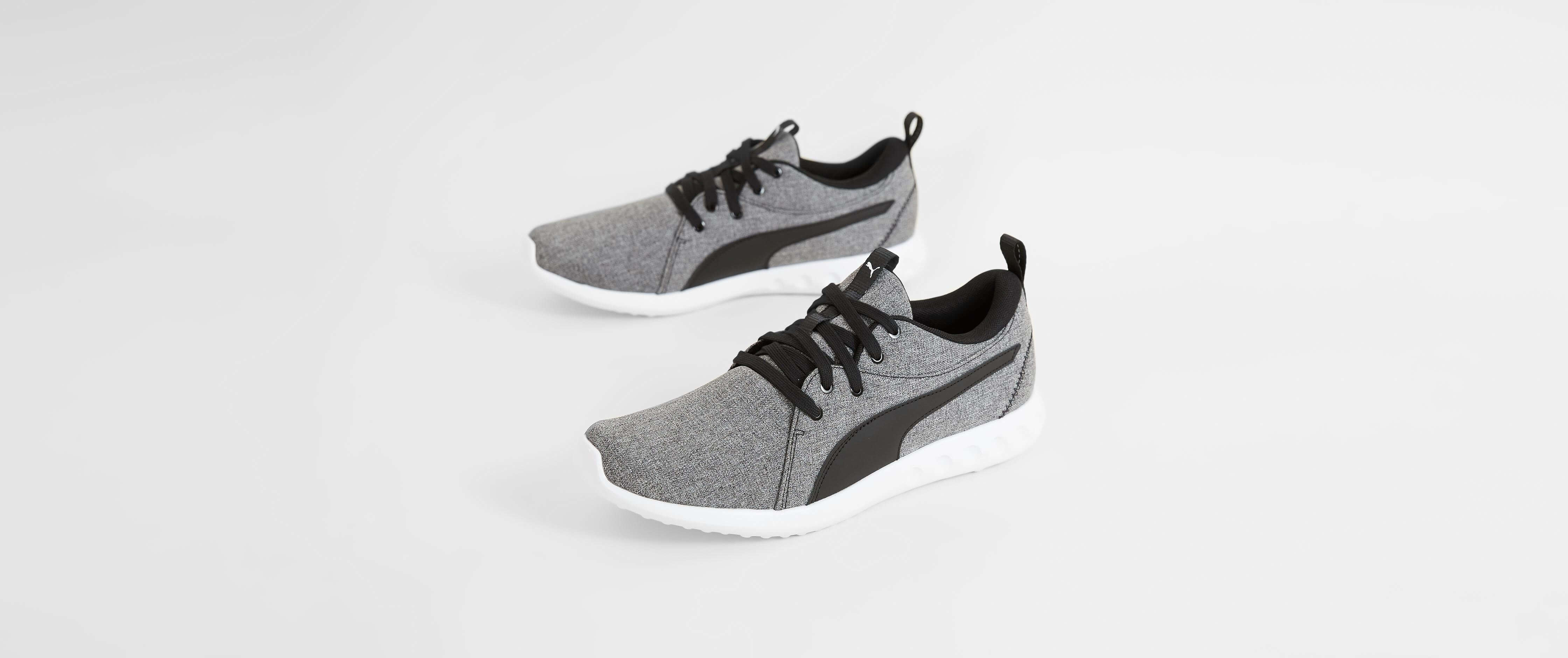 puma black canvas shoes