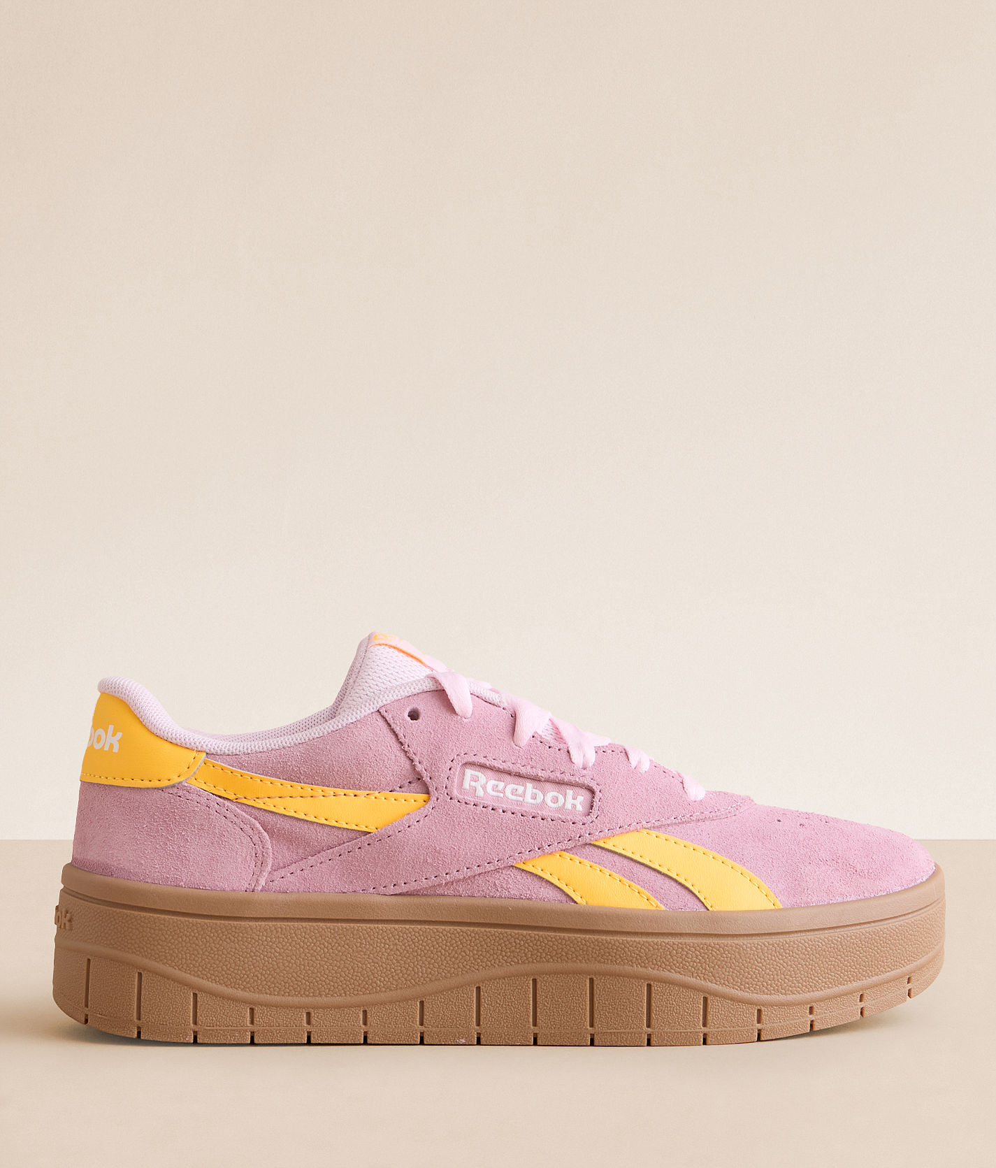 Reebok® Court Advance Surge Leather Sneaker - Women's Shoes in