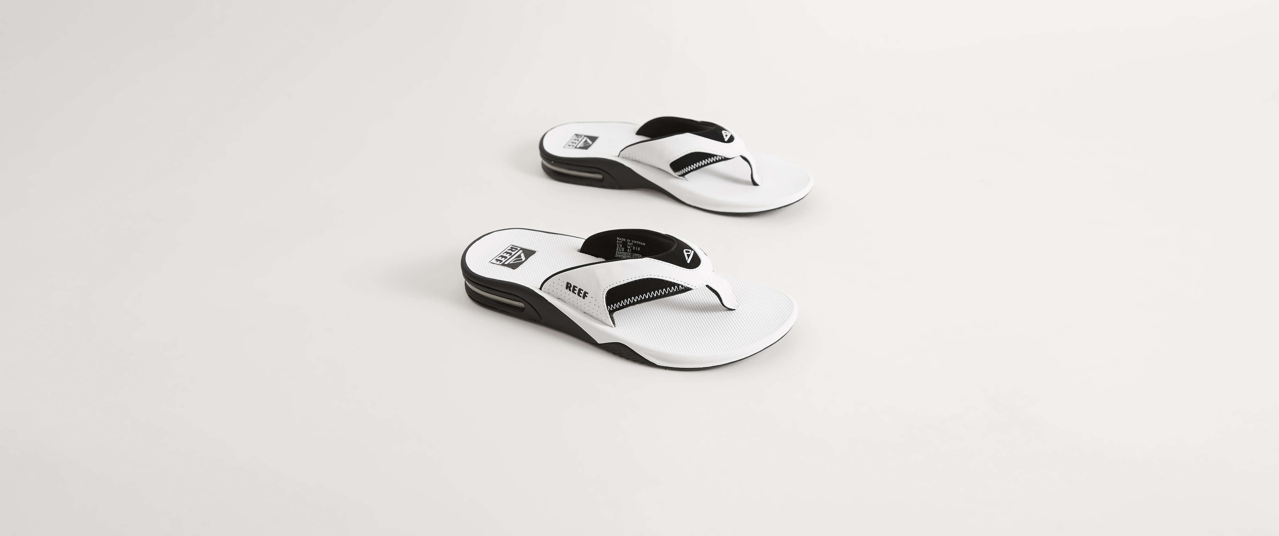 reef white flip flops