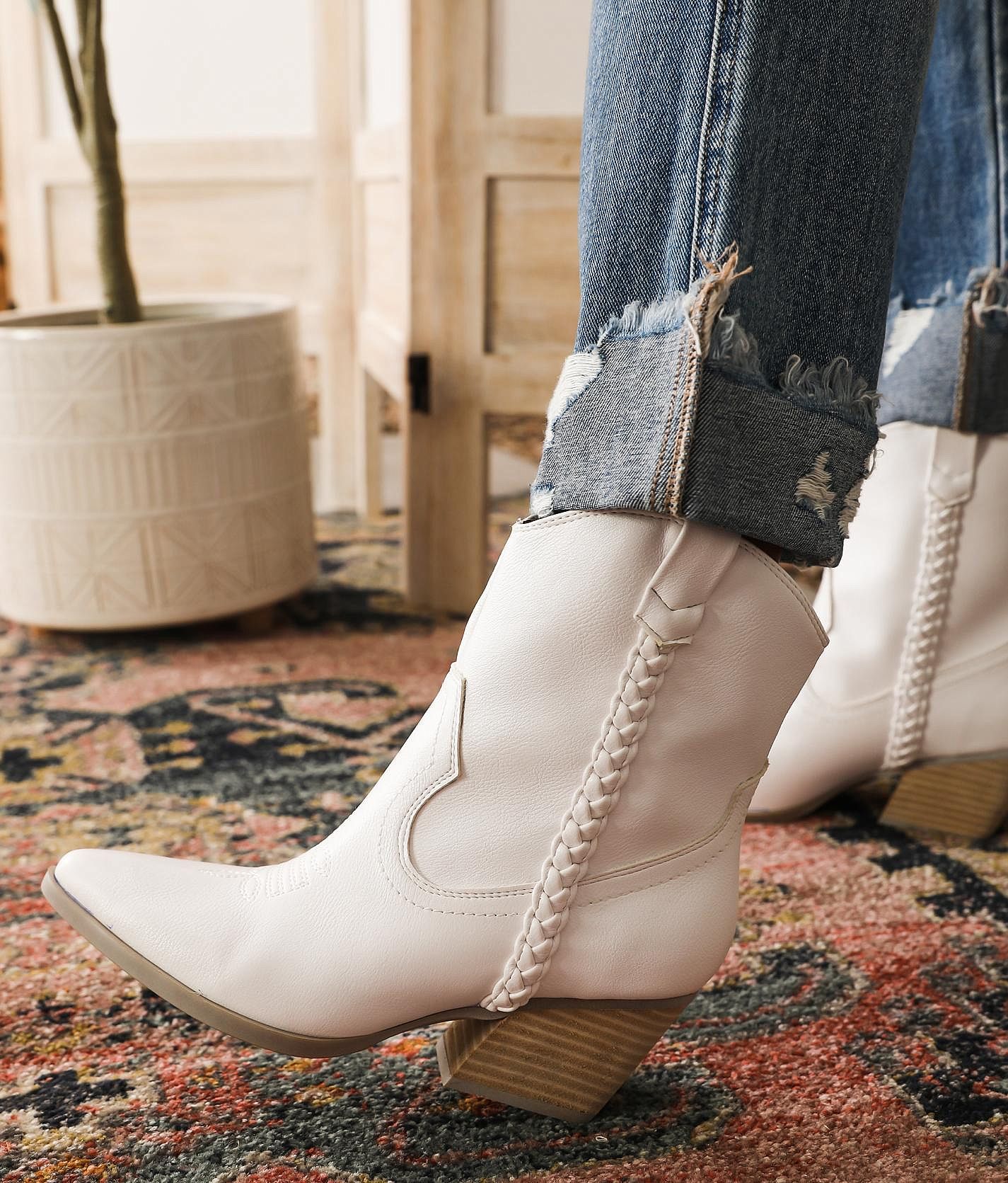 Western booties with clearance buckle